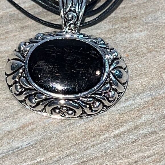 Oval Filagree Pendant With Black Center On Cord - Picture 2 of 6